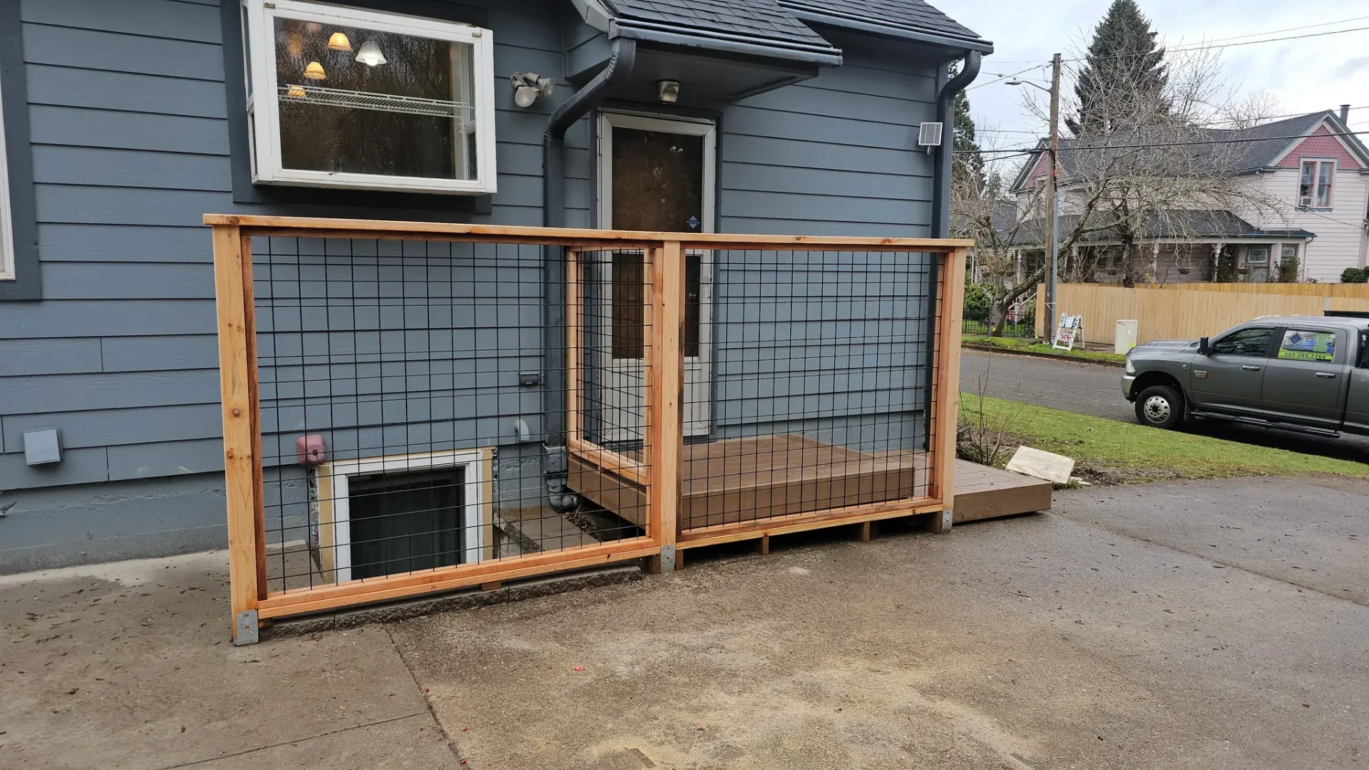 Deck with wire panel railing
